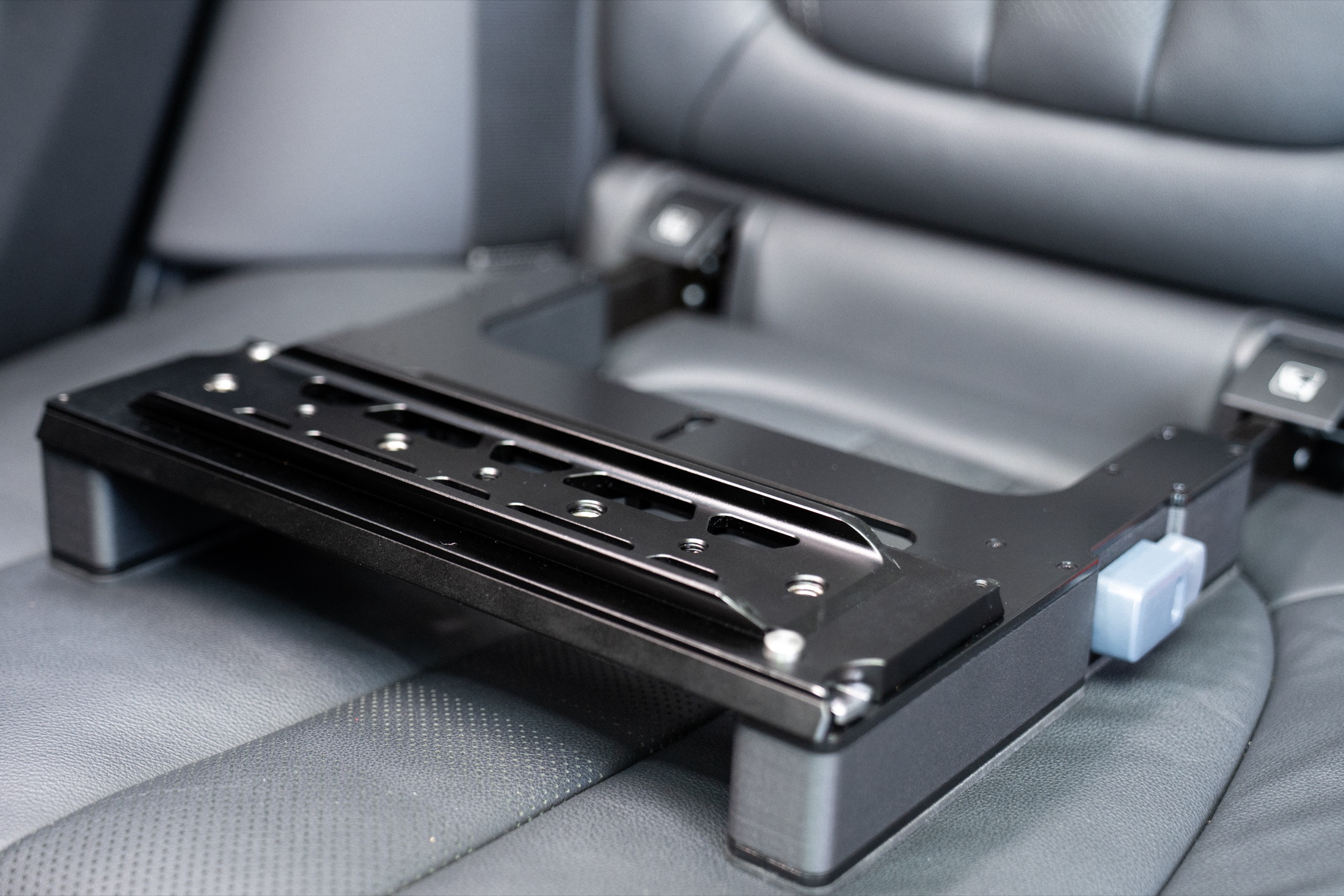 The Gearseat mounted in a rear seat with the baseplate visible