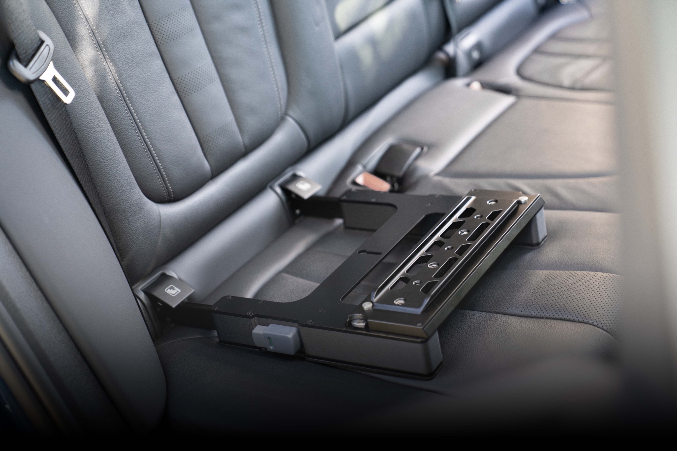 The Gearseat mounted in a rear car seat with a dovetail quick release plate