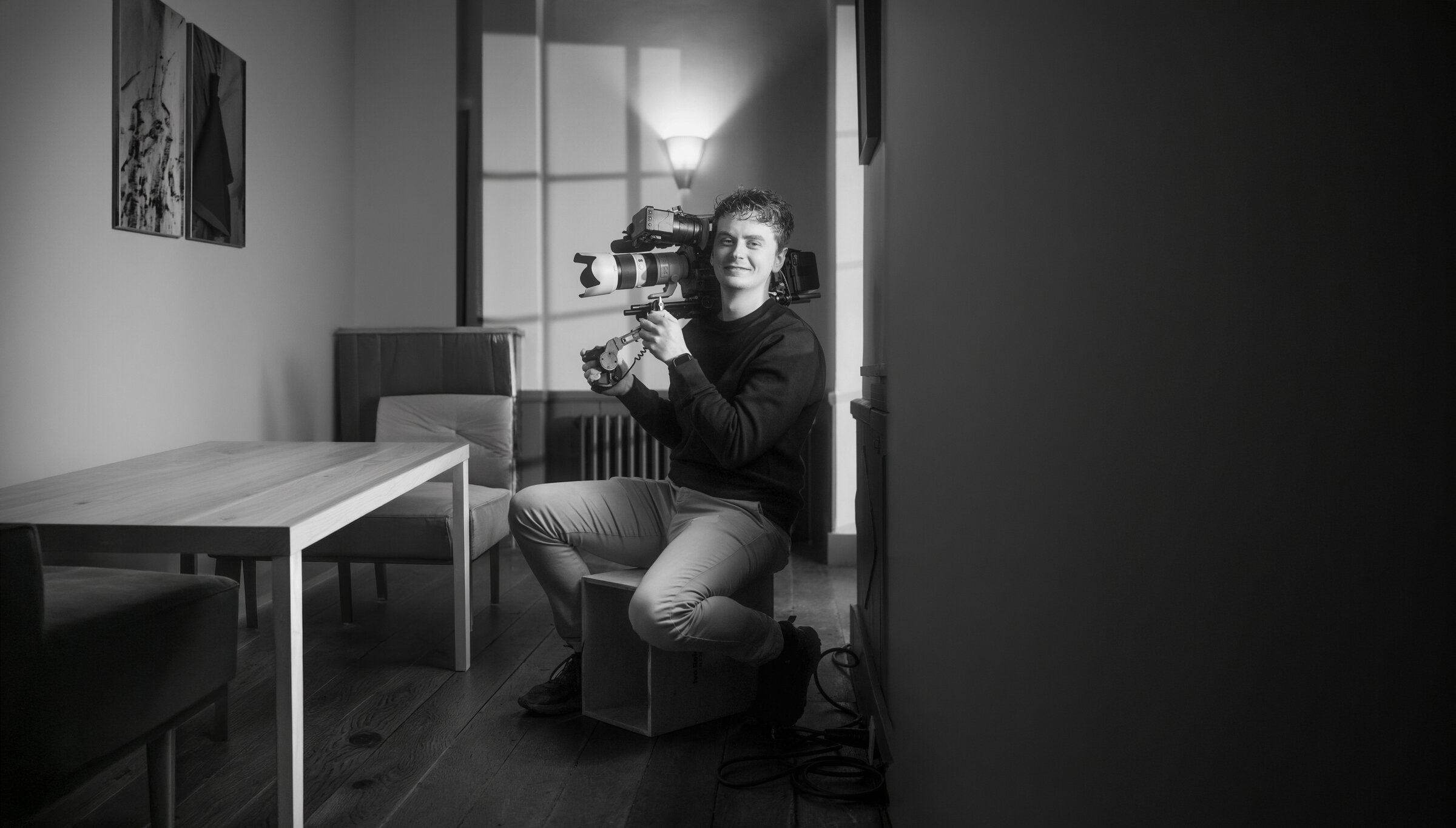 Ivo operating a camera on set
